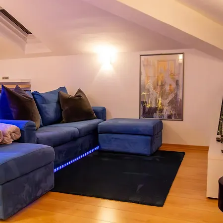 Апартаменты La Mansarda Modern House